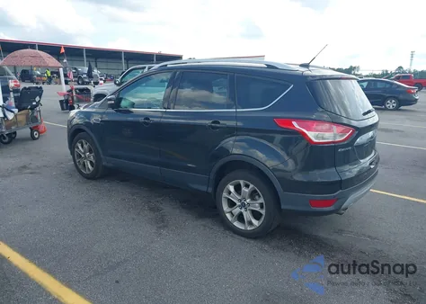 2014 Ford Escape Titanium z USA, uszkodzony, nr VIN 1FMCU9JX3EUD12892